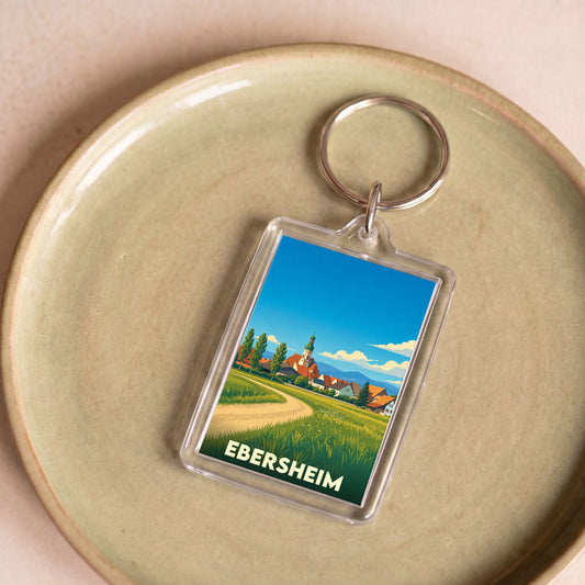 Porte-clés souvenir de la ville d'Ebersheim avec une illustration stylisée.