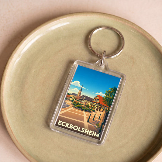 Porte-clés souvenir de la ville de Eckbolsheim avec une illustration stylisée.