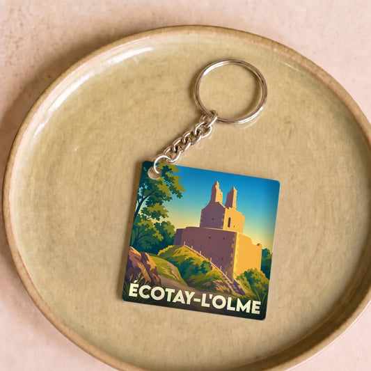 Porte-clés souvenir de la ville de Écotay-l'Olme avec une illustration stylisée d'un monument historique.