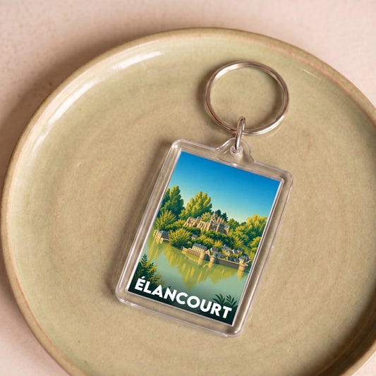 Porte-clés souvenir de la ville de Élancourt avec une illustration paysagère stylisée.