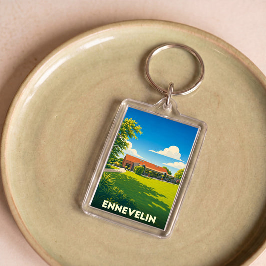 Porte-clés souvenir de la ville d'Ennevelin avec une illustration stylisée d'un paysage ensoleillé.