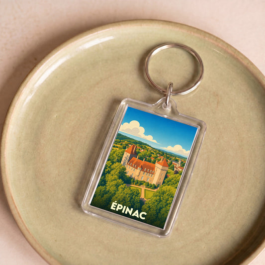 Porte-clés souvenir de la ville d'Épinac avec une illustration stylisée de son château.