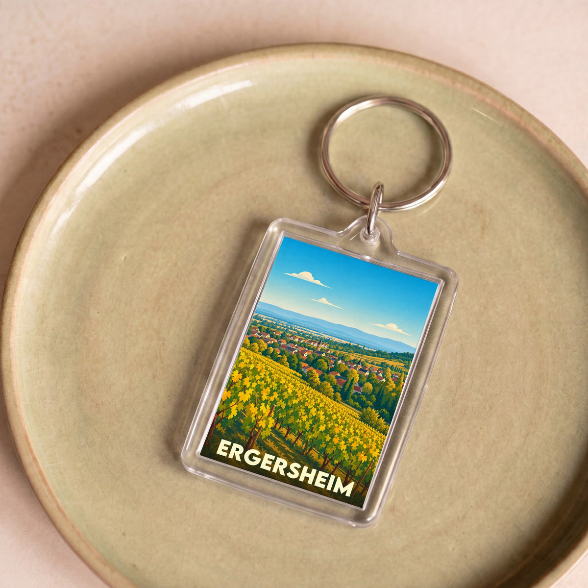 Porte-clés souvenir de la ville d'Ergersheim avec une illustration stylisée de ses vignobles.