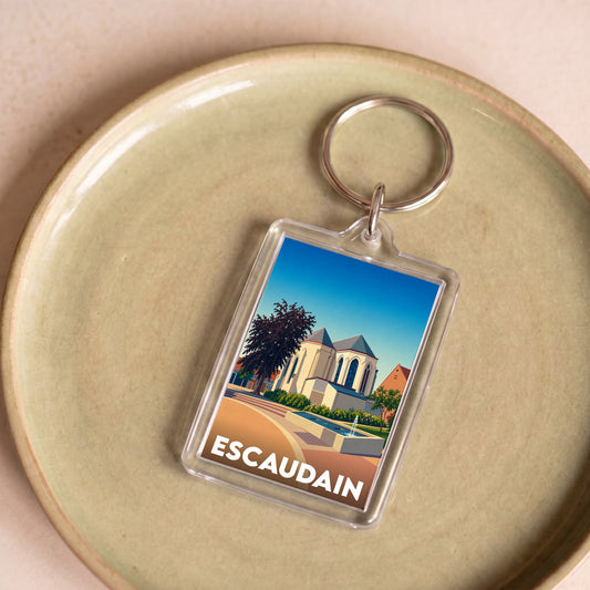Porte-clés souvenir de la ville d'Escaudain avec une illustration stylisée de son église.