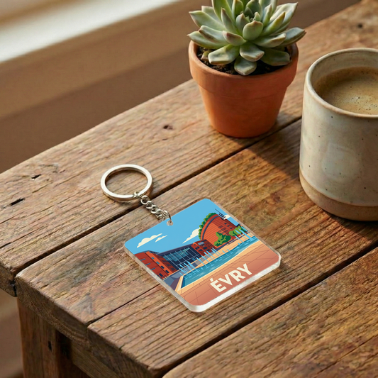 Porte-clés souvenir de la ville d'Évry avec une illustration stylisée.