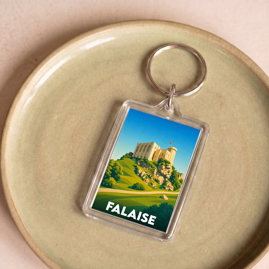 Porte-clés souvenir de la ville de Falaise avec une illustration stylisée de son château.