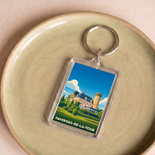 Porte-clés souvenir de la ville de Faverges-de-la-Tour avec une illustration stylisée de son château.