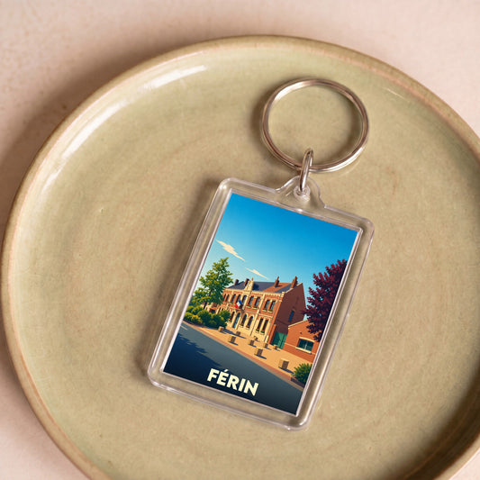 Porte-clés souvenir de la ville de Férin avec une illustration stylisée.