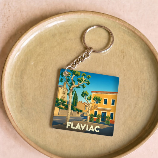 Porte-clés souvenir de la ville de Flaviac avec une illustration stylisée.