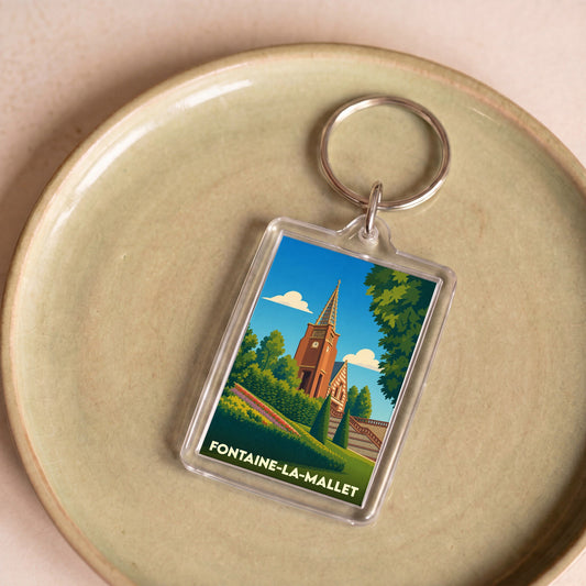 Porte-clés souvenir de la ville de Fontaine-la-Mallet avec une illustration stylisée.