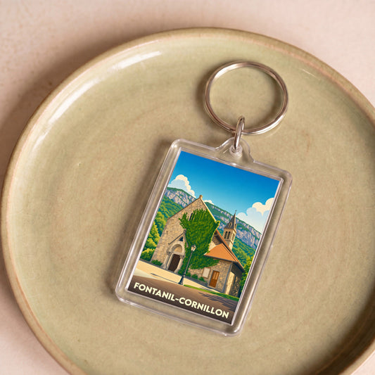 Porte-clés souvenir de la ville de Fontanil-Cornillon avec une illustration stylisée de son église.
