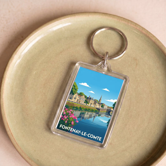 Porte-clés souvenir de la ville de Fontenay-le-Comte avec une illustration stylisée.