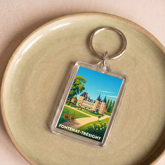 Porte-clés souvenir de la ville de Fontenay-Trésigny avec une illustration stylisée de son château.
