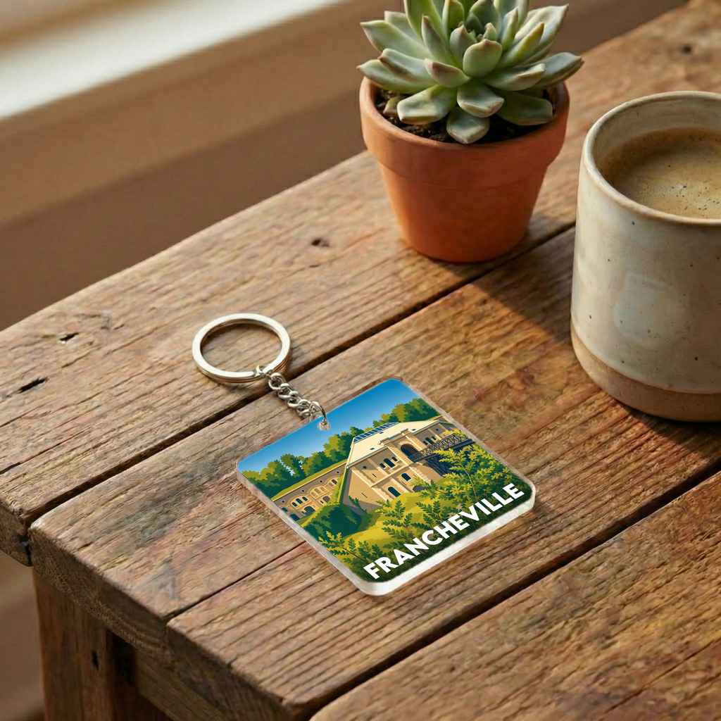 Porte-clés souvenir de la ville de Francheville avec une illustration stylisée.