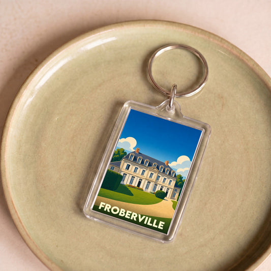 Porte-clés souvenir de la ville de Froberville avec une illustration stylisée d'un château.