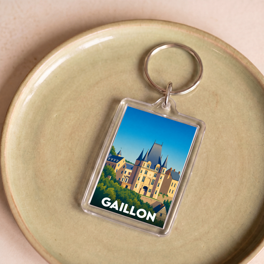 Porte-clés souvenir de la ville de Gaillon avec une illustration stylisée du château local.