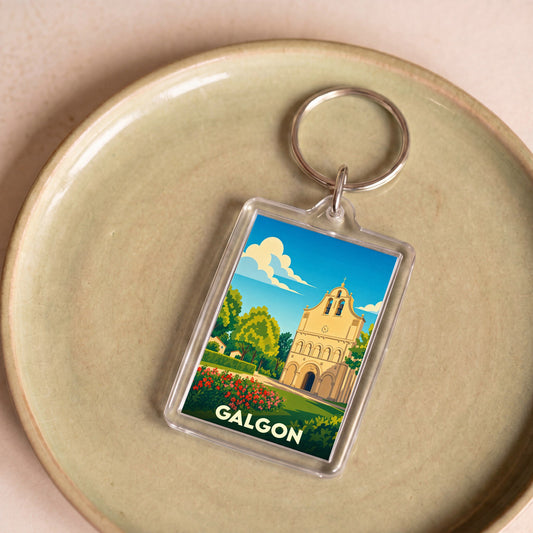 Porte-clés souvenir de la ville de Galgon avec une illustration stylisée de son église.