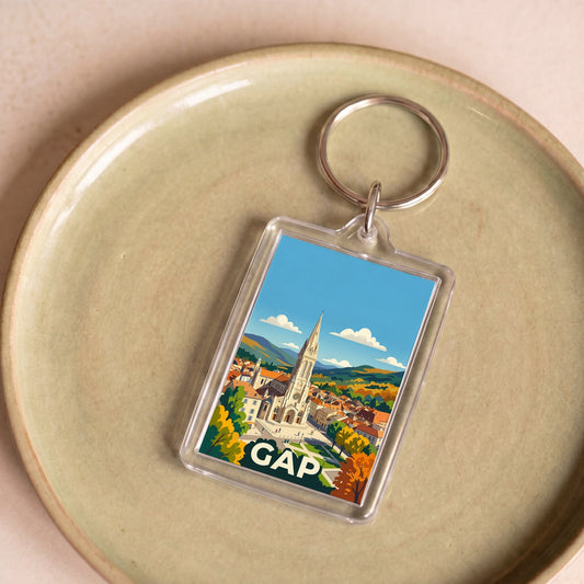 Porte-clés souvenir de la ville de Gap avec une illustration stylisée.