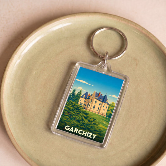 Porte-clés souvenir de la ville de Garchizy avec une illustration stylisée de château.