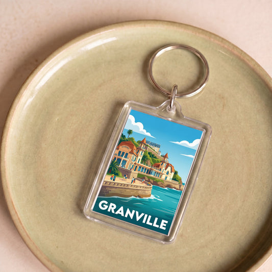 Porte-clés souvenir de la ville de Granville avec une illustration stylisée.