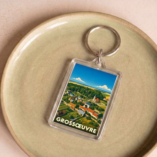 Porte-clés souvenir de la ville de Grossœuvre avec une illustration stylisée.