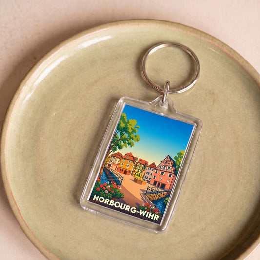 Porte-clés souvenir de la ville de Horbourg-Wihr avec une illustration colorée de maisons à colombages.