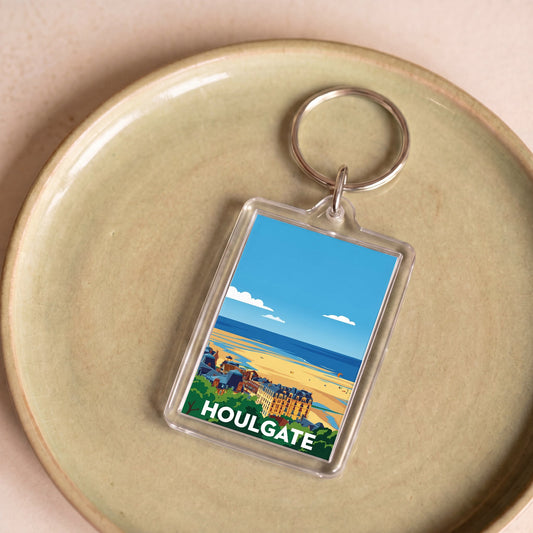 Porte-clés souvenir de la ville de Houlgate avec une illustration stylisée.