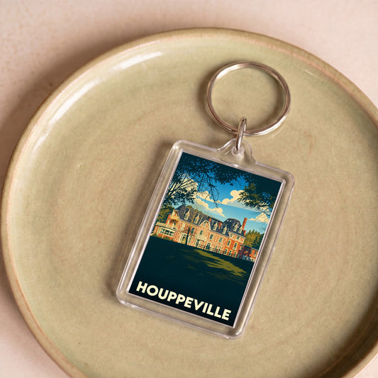 Porte-clés souvenir de la ville de Houppeville avec une illustration stylisée d'un manoir normand.