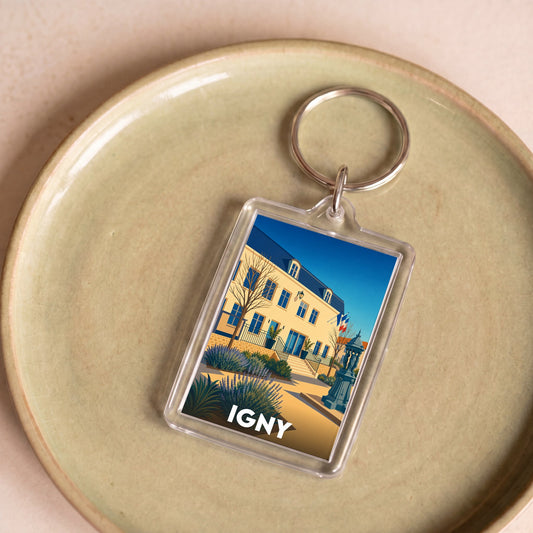 Porte-clés souvenir de la ville d'Igny avec une illustration stylisée de son hôtel de ville.