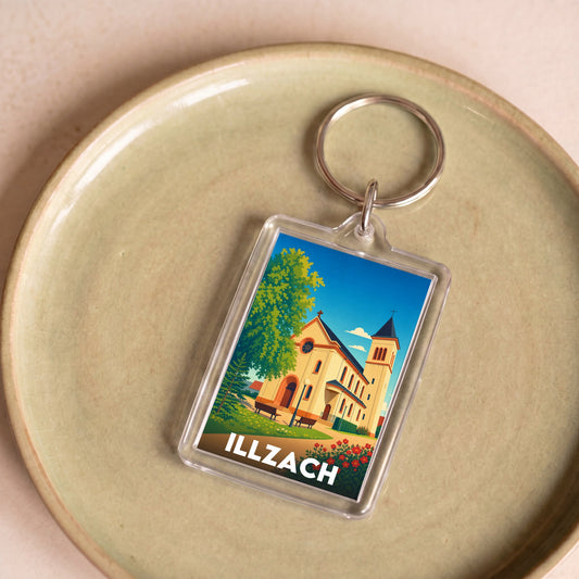 Porte-clés souvenir de la ville d'Illzach avec une illustration stylisée d'une église locale.