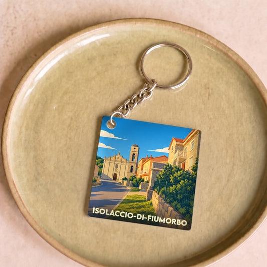 Porte-clés souvenir de la ville de Isolaccio-di-Fiumorbo avec une illustration stylisée.