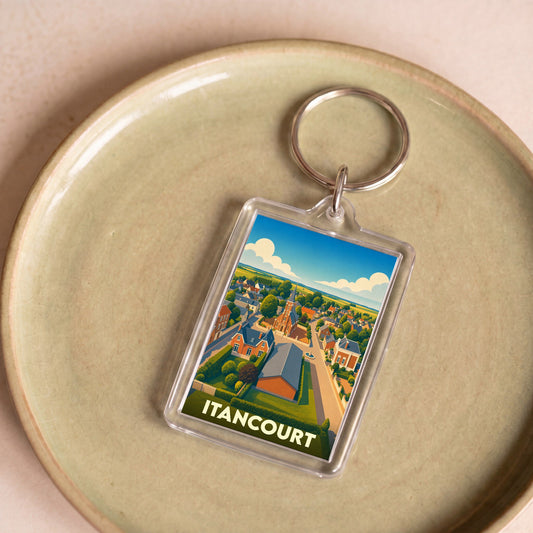 Porte-clés souvenir de la ville d'Itancourt avec une illustration stylisée.