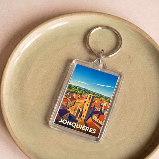 Porte-clés souvenir de la ville de Jonquières avec une illustration stylisée.
