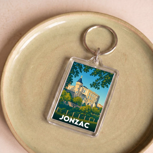 Porte-clés souvenir de la ville de Jonzac avec une illustration stylisée de son château.