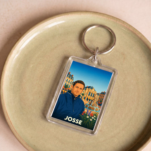 Porte-clés souvenir de la ville de Josse avec une illustration stylisée.