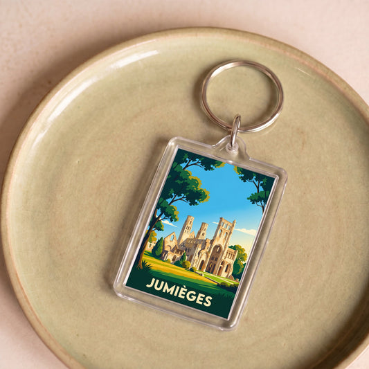 Porte-clés souvenir de la ville de Jumièges avec une illustration stylisée de son abbaye.