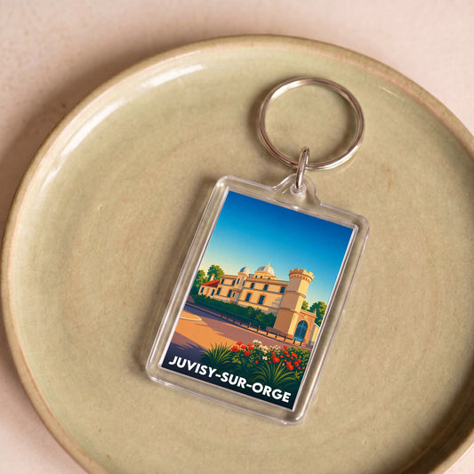 Porte-clés souvenir de la ville de Juvisy-sur-Orge avec une illustration stylisée.