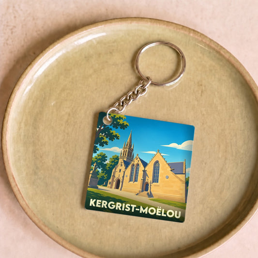 Porte-clés souvenir de la ville de Kergrist-Moëlou avec une illustration stylisée de son église.