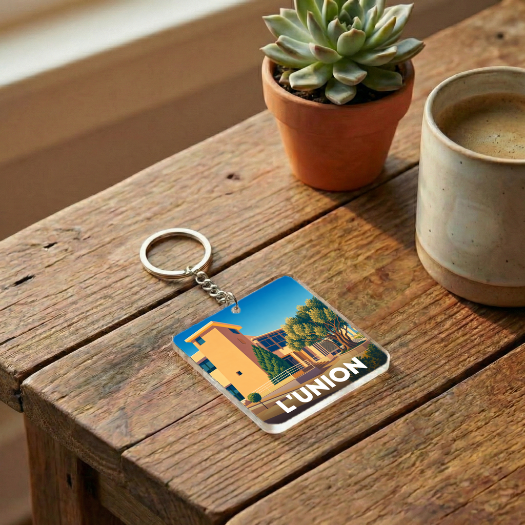 Porte-clés souvenir de la ville de L'Union avec une illustration stylisée.
