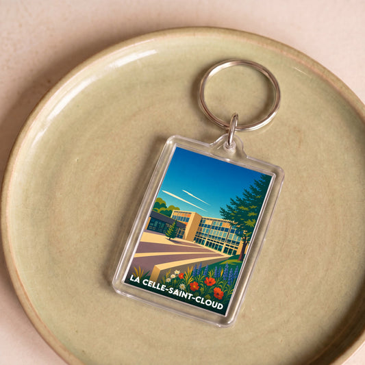 Porte-clés souvenir de la ville de La Celle-Saint-Cloud avec une illustration stylisée.