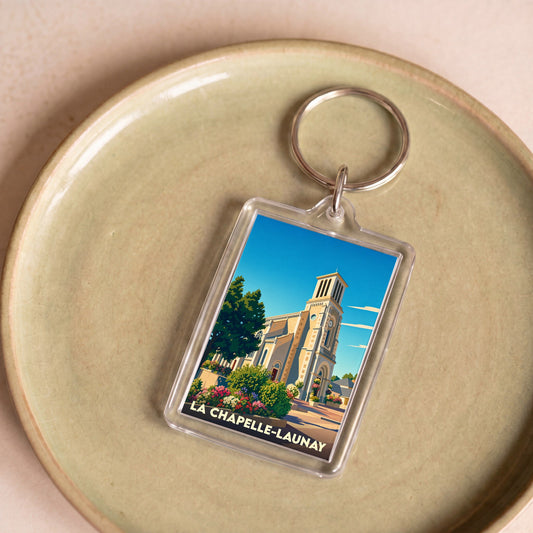 Porte-clés souvenir de la ville de La Chapelle-Launay avec une illustration stylisée de son église.