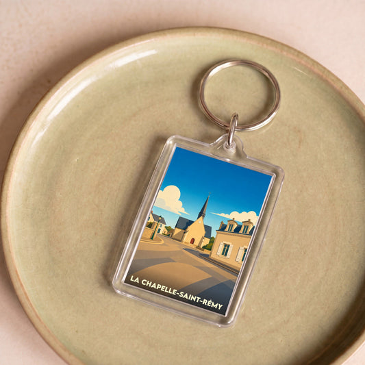 Porte-clés souvenir de la ville de La Chapelle-Saint-Rémy avec une illustration stylisée.
