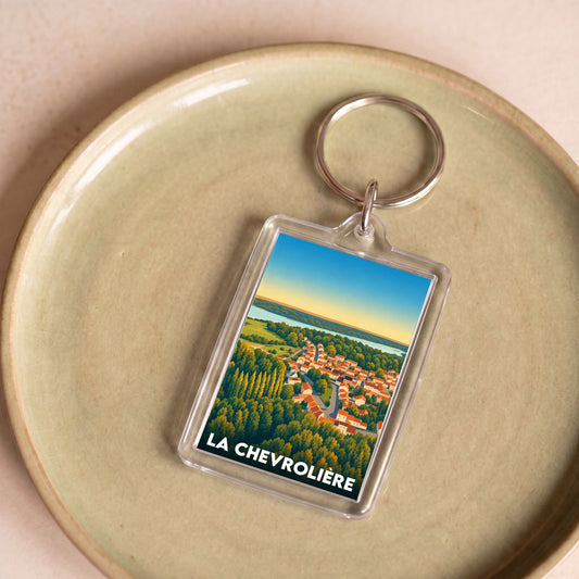 Porte-clés souvenir de la ville de La Chevrolière avec une illustration stylisée.