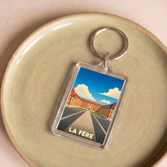 Porte-clés souvenir de la ville de La Fère avec une illustration stylisée.