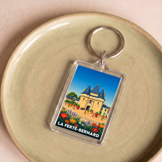 Porte-clés souvenir de la ville de La Ferté-Bernard avec une illustration stylisée.