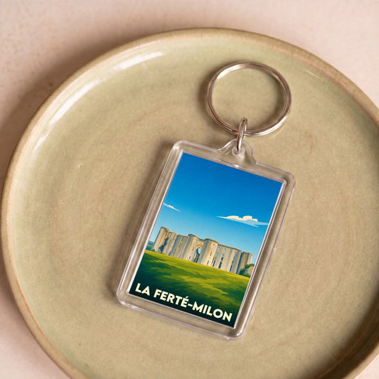 Porte-clés souvenir de la ville de La Ferté-Milon avec une illustration stylisée de son château.