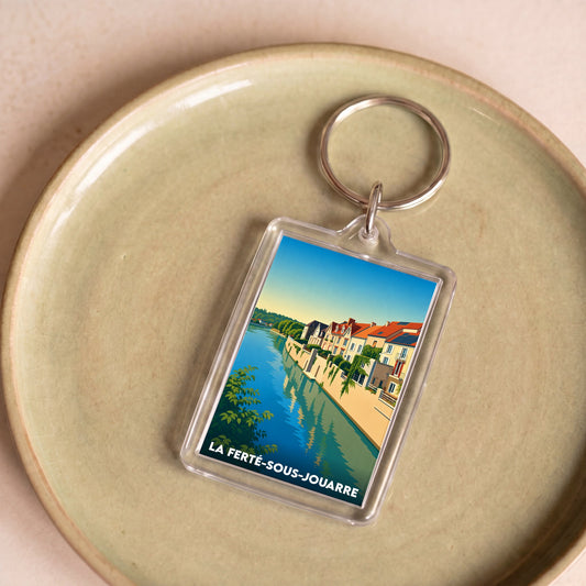 Porte-clés souvenir de la ville de La Ferté-sous-Jouarre avec une illustration stylisée.