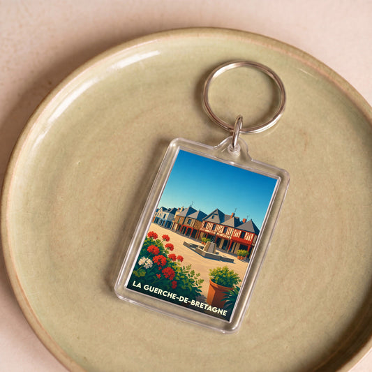 Porte-clés souvenir de la ville de La Guerche-de-Bretagne avec une illustration stylisée.