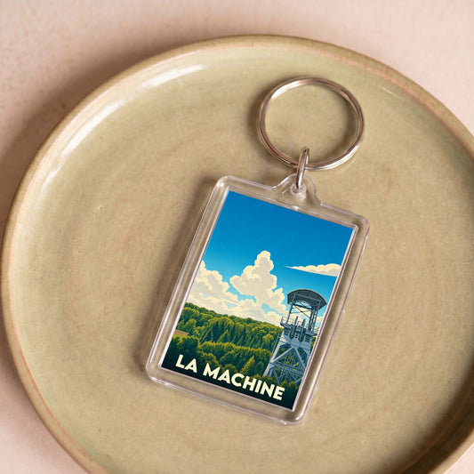 Porte-clés souvenir de la ville de La Machine avec une illustration stylisée d'un chevalement de mine.