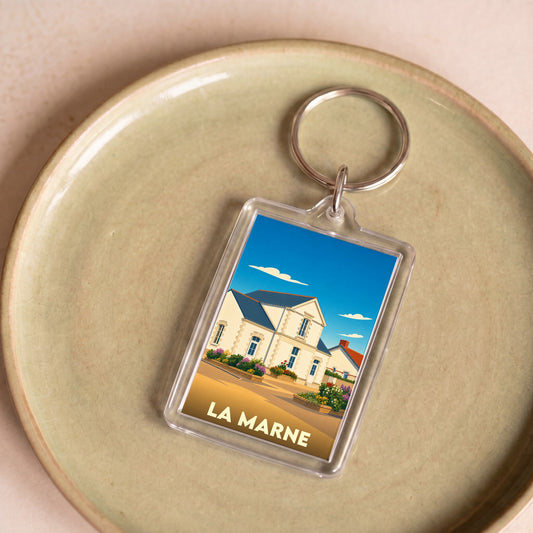 Porte-clés souvenir de la ville de La Marne avec une illustration stylisée de sa mairie.